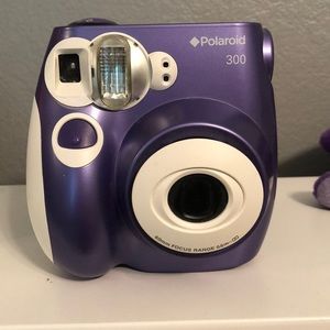 Polaroid camera plus two unopened film packs!